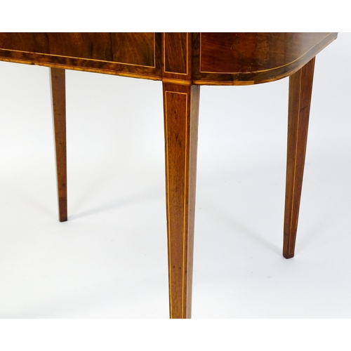 1468 - A late 18thC / early 19thC mahogany card table with satinwood crossbanded decoration, the table rais... 