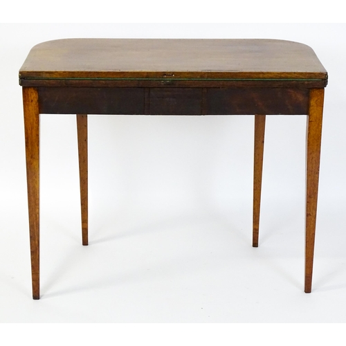 1468 - A late 18thC / early 19thC mahogany card table with satinwood crossbanded decoration, the table rais... 