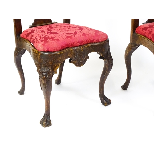 1581 - A pair of 18thC Anglo-Portuguese dining chairs with unusual shaped and carved cresting rails above p... 