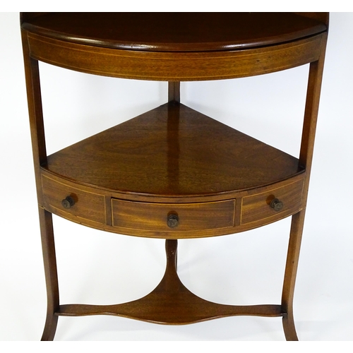 1604 - A late Georgian mahogany washstand with a removeable top. The stand having a large upstand above two... 