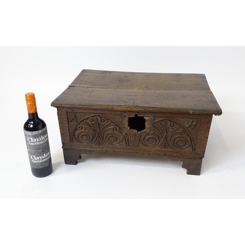 1093 - A late 17thC oak bible box with carved detail to front. Approx. 9 3/4