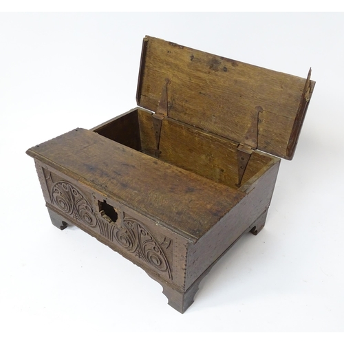 1093 - A late 17thC oak bible box with carved detail to front. Approx. 9 3/4