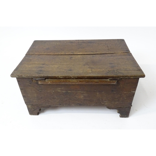 1093 - A late 17thC oak bible box with carved detail to front. Approx. 9 3/4