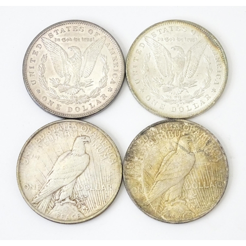 824 - A quantity of assorted United States of America coins, various dates and denominations, to include h... 