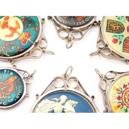 826 - Seven enamel coin formed pendants / fobs in captive mounts depicting various monarchs. Together with... 