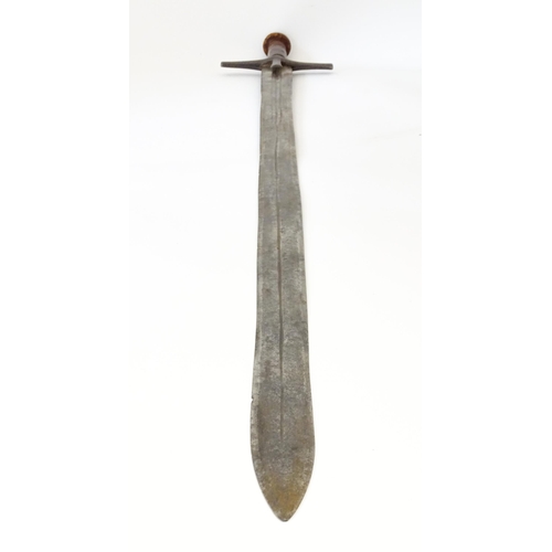 839 - Militaria : an early 20thC Sudanese Kaskara sword and scabbard, the leather covered handle with disc... 