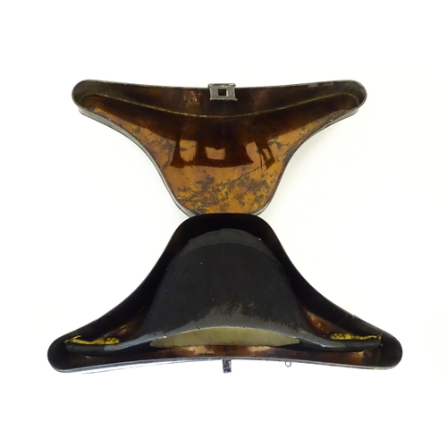 841 - Militaria : a 19thC Royal Navy Officer's bicorn hat by J Baker & Co of Portsmouth , the interior wit... 