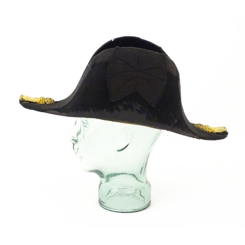 841 - Militaria : a 19thC Royal Navy Officer's bicorn hat by J Baker & Co of Portsmouth , the interior wit... 