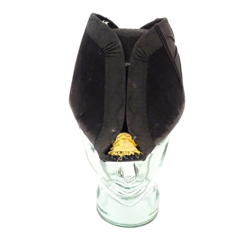 841 - Militaria : a 19thC Royal Navy Officer's bicorn hat by J Baker & Co of Portsmouth , the interior wit... 