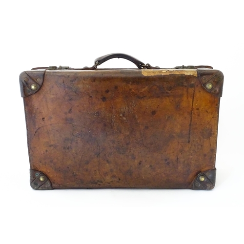 844 - Militaria, WWI / World War 1 / First World War / WWI : an early 20thC leather suitcase by Army & Nav... 