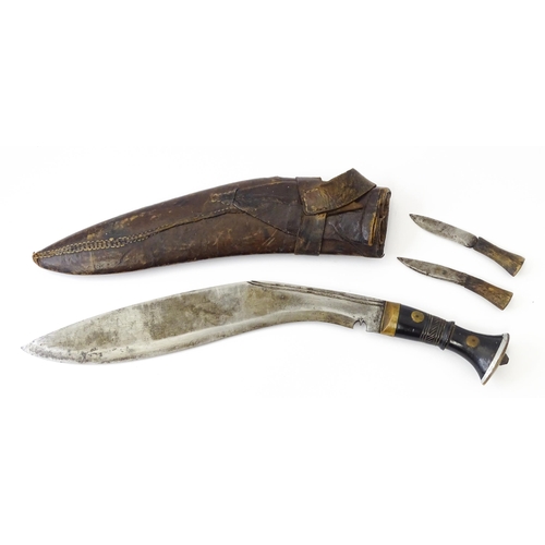 847 - An early 20thC Kukri / Khukuri knife and sheath, the steel blade with double fuller and carved horn ... 