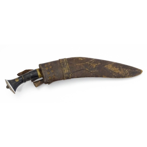 847 - An early 20thC Kukri / Khukuri knife and sheath, the steel blade with double fuller and carved horn ... 