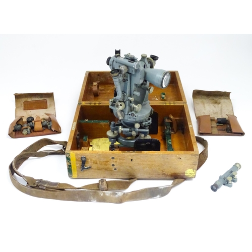 1185 - An early to mid 20thC cased 'Tavistock' theodolite by Cooke, Troughton and Simms, York. Stamped with... 