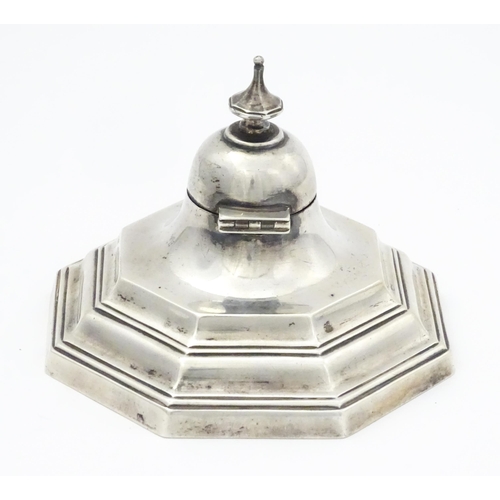 314A - A silver inkwell of octagonal form  hallmarked Sheffield 1903 maker Hawksworth, Eyre & Co Ltd. Appro... 