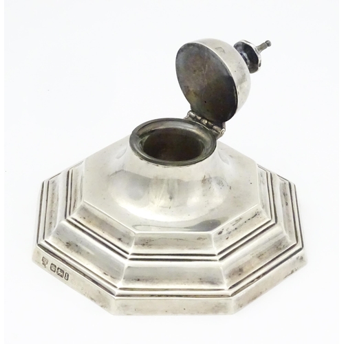 314A - A silver inkwell of octagonal form  hallmarked Sheffield 1903 maker Hawksworth, Eyre & Co Ltd. Appro... 