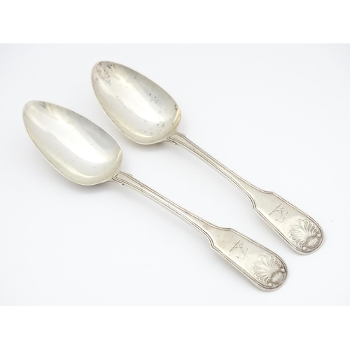 433A - A pair of George III Irish silver fiddle thread and shell pattern table spoons hallmarked Dublin 181... 