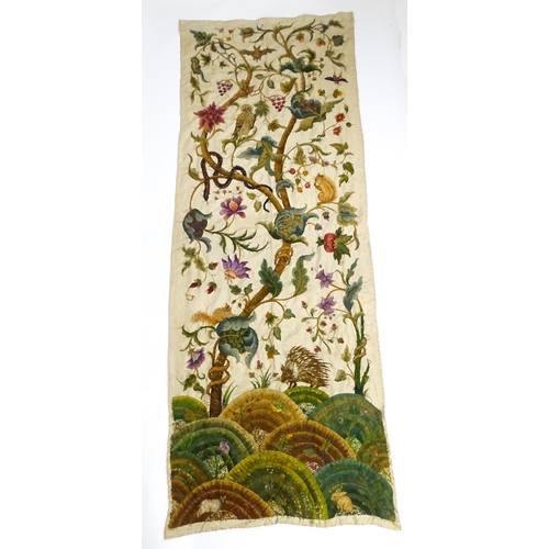 1095 - A large early 20thC Arts & Crafts crewelwork embroidery with tree of life design with flowers, folia... 