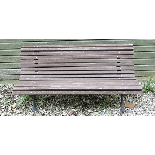 1335 - An early 20thC tennis bench , with Coalbrookdale style cast iron frame and hardwood slats , approx 6... 