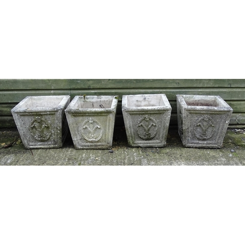 1337 - Four matching reconstituted stone planters, of tapering form and decorated with Prince of Wales' fea... 