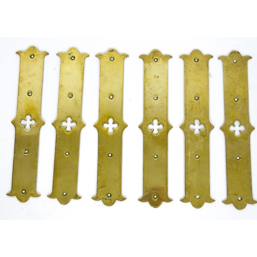 1347 - A quantity of cast brass Gothic revival door fingerplates, with pierced quatrefoil decoration to the... 