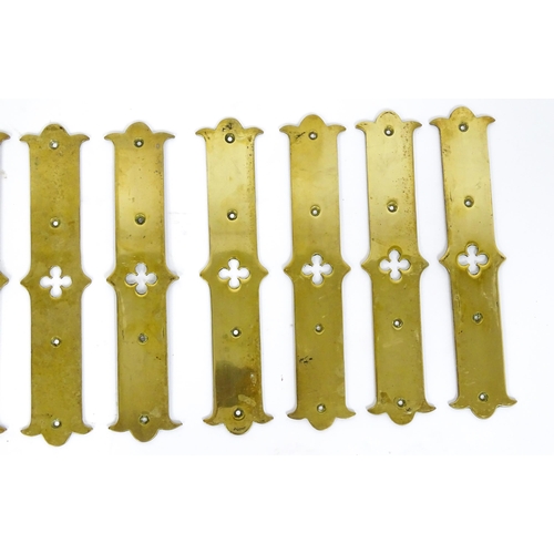 1347 - A quantity of cast brass Gothic revival door fingerplates, with pierced quatrefoil decoration to the... 