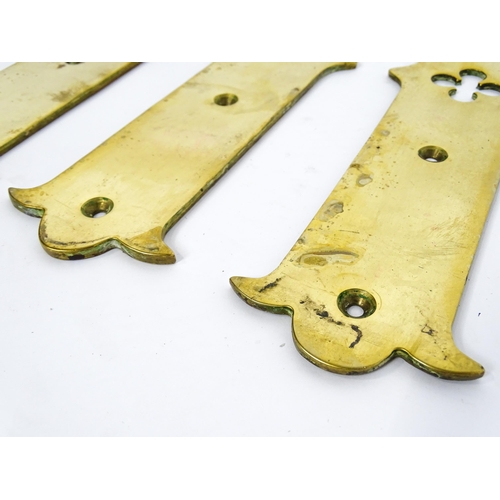 1347 - A quantity of cast brass Gothic revival door fingerplates, with pierced quatrefoil decoration to the... 