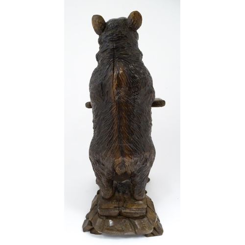 1272 - A late 19thC German carved Black Forest stick stand / umbrella stand of stand bear form. Approx. 34 ... 