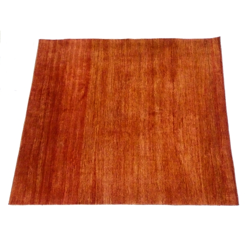 1350 - Carpet / Rug : A large carpet with a red ground. Approx. 113