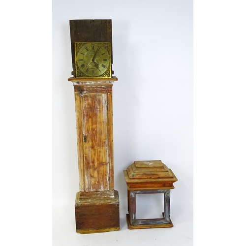 1389 - Local interest : A brass faced 30 hour long case clock the dial with Roman Chapter ring and Arabic s... 