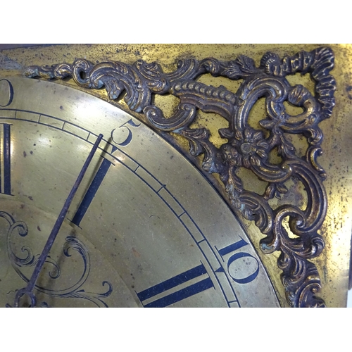 1389 - Local interest : A brass faced 30 hour long case clock the dial with Roman Chapter ring and Arabic s... 