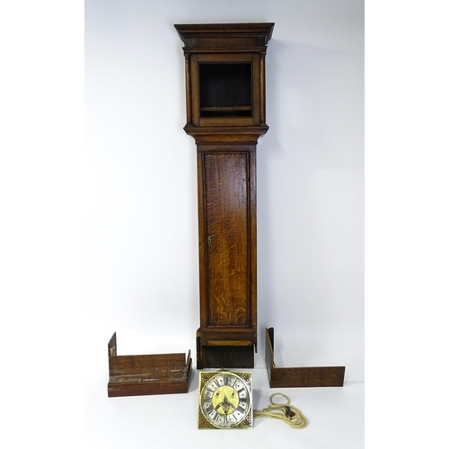 1391A - Henry South : An 18thC oak cased longcase clock, the brass dial with automaton eyes, silvered chapte... 