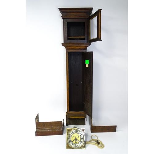 1391A - Henry South : An 18thC oak cased longcase clock, the brass dial with automaton eyes, silvered chapte... 