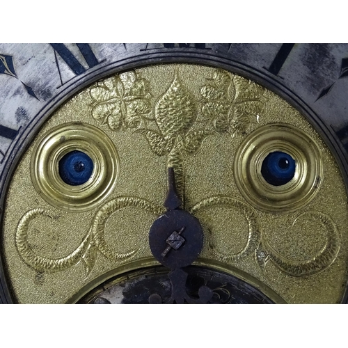 1391A - Henry South : An 18thC oak cased longcase clock, the brass dial with automaton eyes, silvered chapte... 