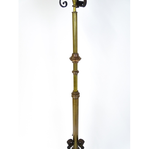 1432 - An Arts & Crafts telescopic standard lamp with oil lamp to top and cast iron base. Approx. 71