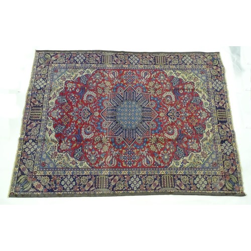 1376 - Carpet / Rug : A Central Persian Isafhan rug the red ground with central blue floral motif, further ... 