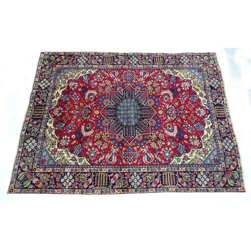 1376 - Carpet / Rug : A Central Persian Isafhan rug the red ground with central blue floral motif, further ... 