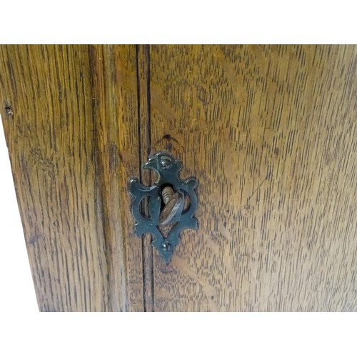 1392A - Thomas Knight of Thaxted : An 18thC oak cased 30 hour longcase clock striking on a bell, the dial ha... 