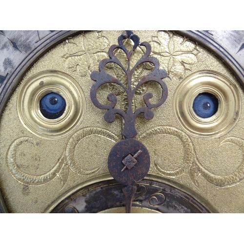 1391A - Henry South : An 18thC oak cased longcase clock, the brass dial with automaton eyes, silvered chapte... 