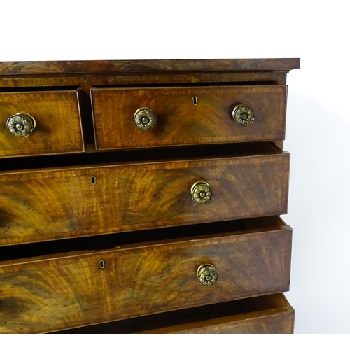 1460 - A 19thC mahogany chest of drawers of large proportions, the chest having a crossbanded top and drawe... 