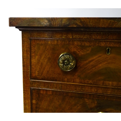 1460 - A 19thC mahogany chest of drawers of large proportions, the chest having a crossbanded top and drawe... 