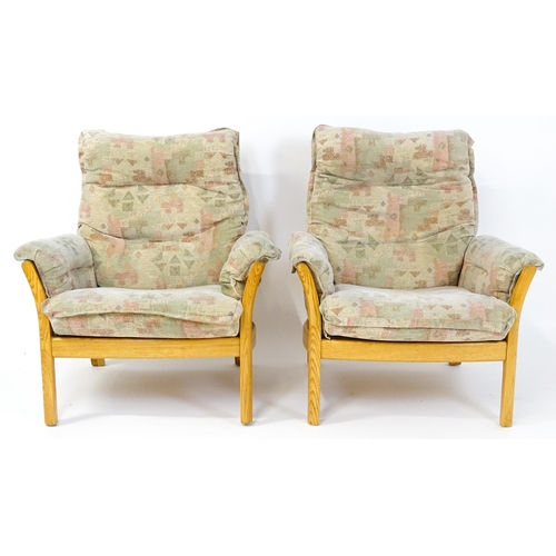 1637 - A modern Ercol three-piece suite, model 930LT, comprising two-seater sofa and two armchairs with gre... 