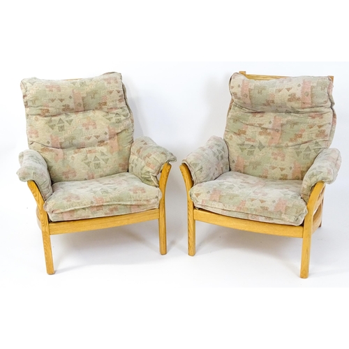 1637 - A modern Ercol three-piece suite, model 930LT, comprising two-seater sofa and two armchairs with gre... 