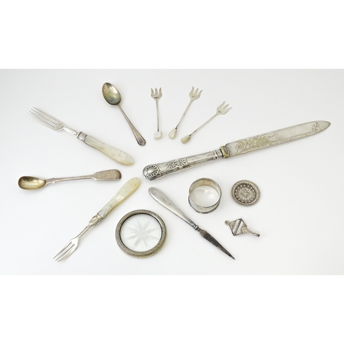 481 - Assorted silver and silver plate items to include a silver napkin holder hallmarked Birmingham 1924,... 