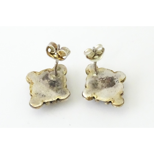 660 - A pair of silver earrings set with blue stones. Together with a single gilt metal drop earring with ... 