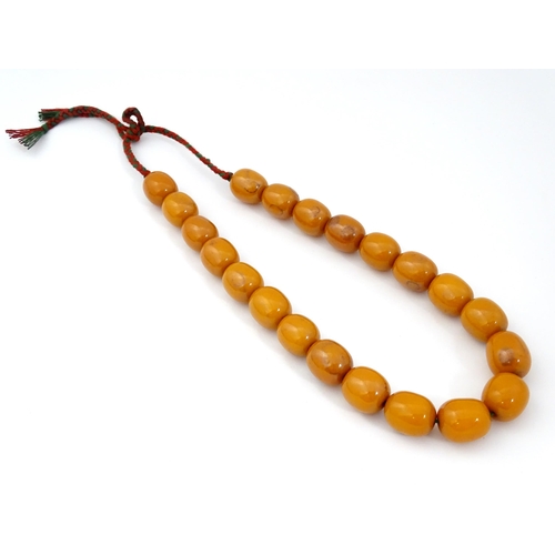 780 - Two vintage bead necklaces of amber coloured beads (2)