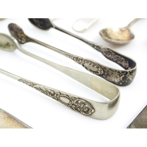 581 - A quantity of silver plated wares to include assorted flatware / cutlery, sugar tongs, teaspoons, co... 