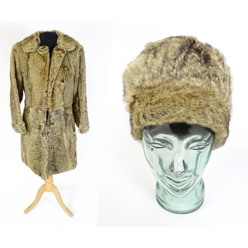 1311 - Vintage fashion / clothing: A mid length fur coat with matching hat. Chest approx. 36