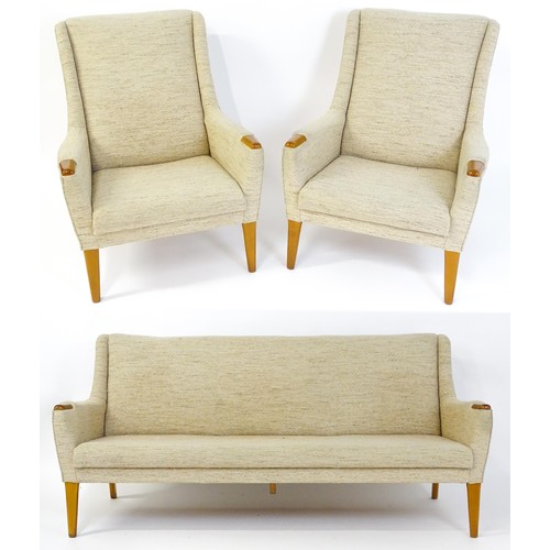 1636 - A mid 20thC Parker Knoll three piece suite , model P.K.960/1/2/3, comprising three-seater sofa and t... 