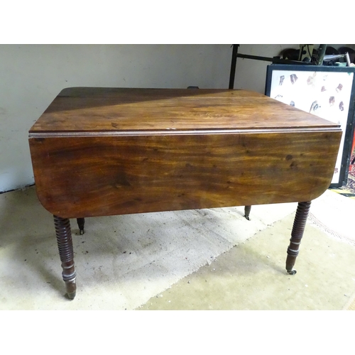 18 - A 19thC mahogany Pembroke table with single drawer, standing on four turned legs, the top approx 44