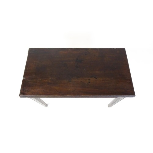 27 - An 18thC mahogany tea table raised on five chamfered tapered legs. 36